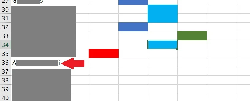 A screenshot of the spreadsheet showing several DNA matches already have been assigned red, green, or blue, indicating that they are probably related to my mom through her grandmother Emma R's ancestors