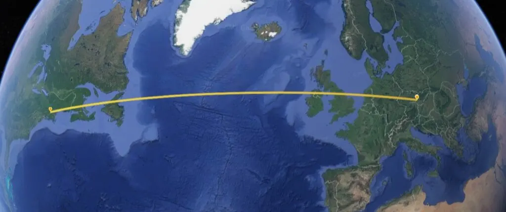 Screen capture from Google Earth from a custom project with plots from Slovakia and Massachusetts, and a yellow line between them to indicate the migration from one continent to the other
