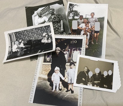 several old photographs lying on a flat surface